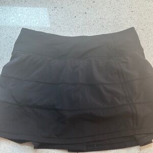 Women’s Lululemon Black athletic skort. Size label cut out but estimate at 2R.